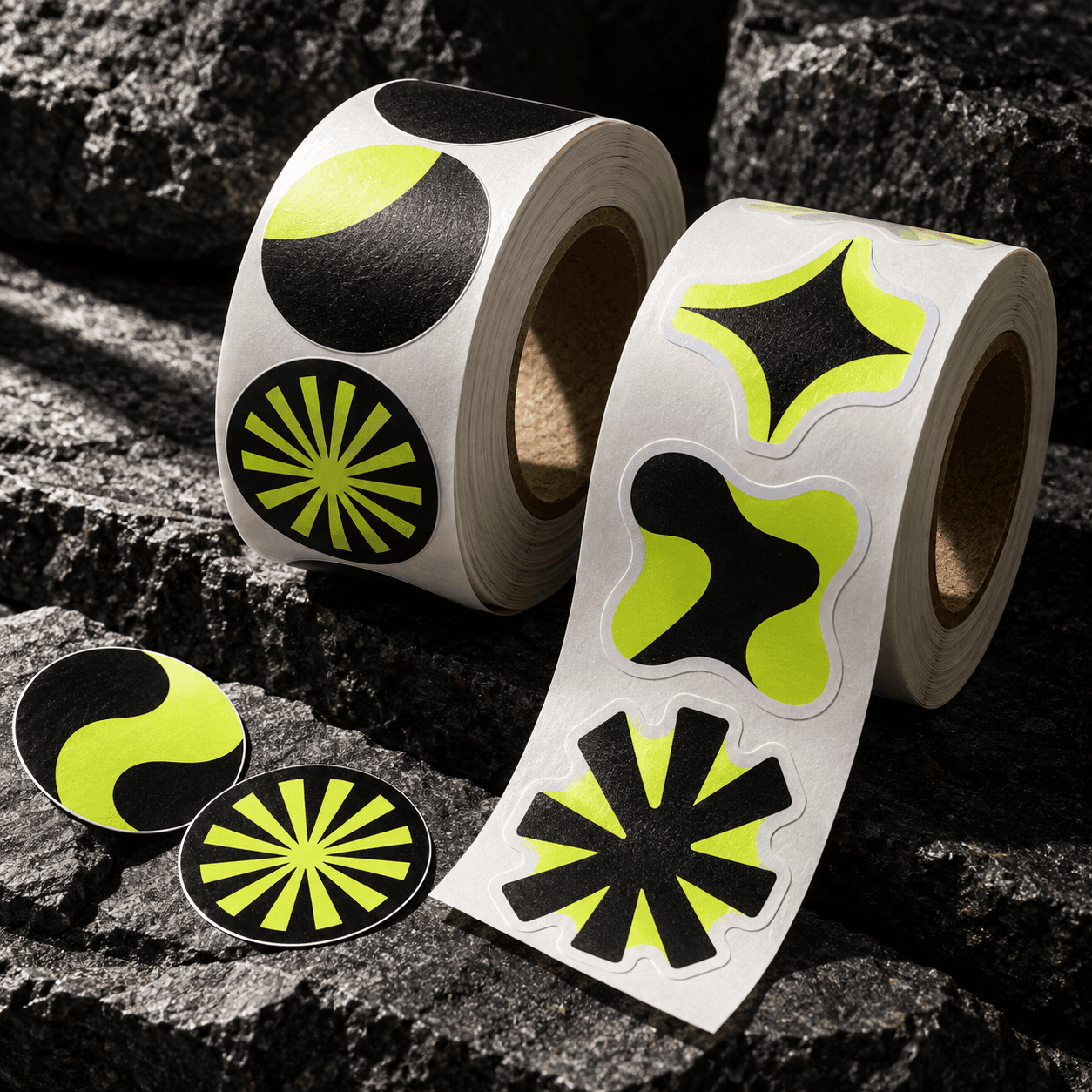 Roll of die-cut stickers with graphic motifs