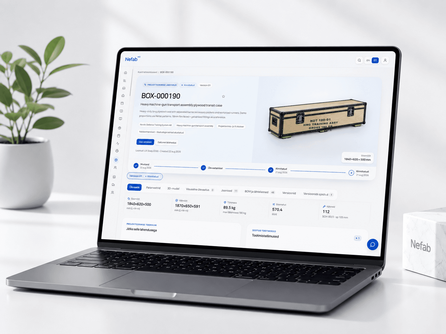 Laptop showing the Nefab M3 box solution record BOX-000190 with its approval stages and specification panel